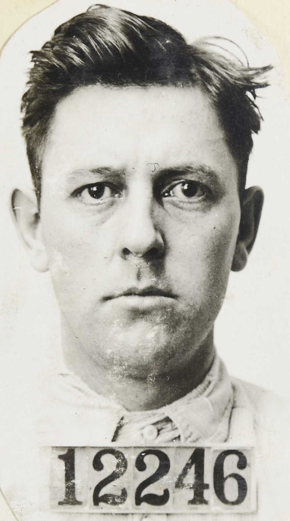 Prisoner mugshot of Fred Burke from the State Prison of Southern Michigan in Jackson, front view only. His prisoner number shown is 12246.